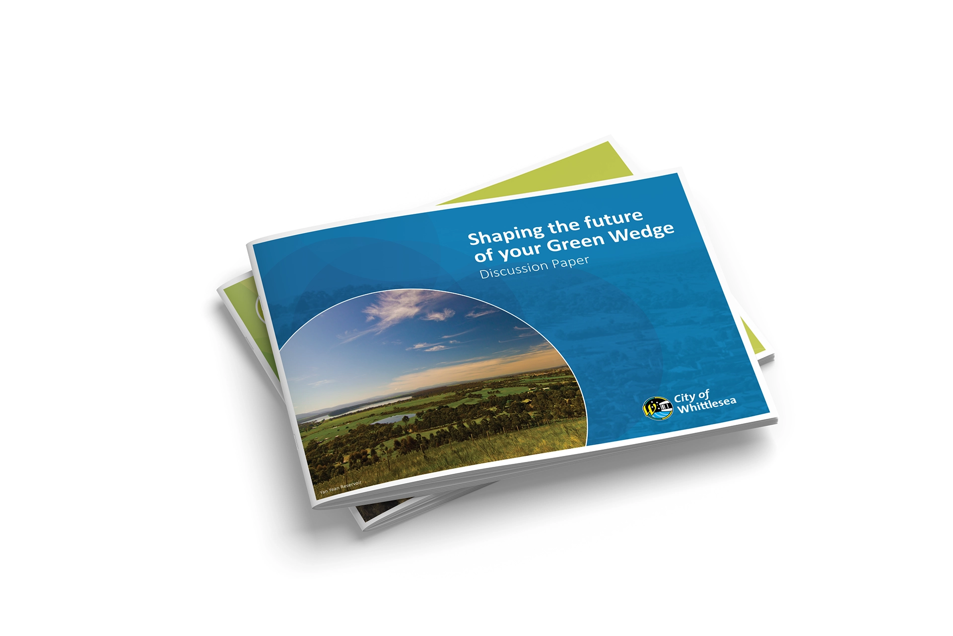 Two different brochures on top of one another one with a blue cover is mostly visible over a green covered one below